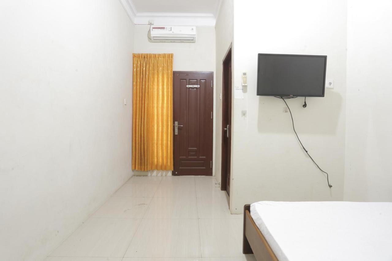 Oyo 93119 Guest House Leo Patra Muara Badak 外观 照片