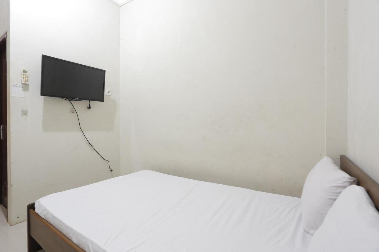 Oyo 93119 Guest House Leo Patra Muara Badak 外观 照片