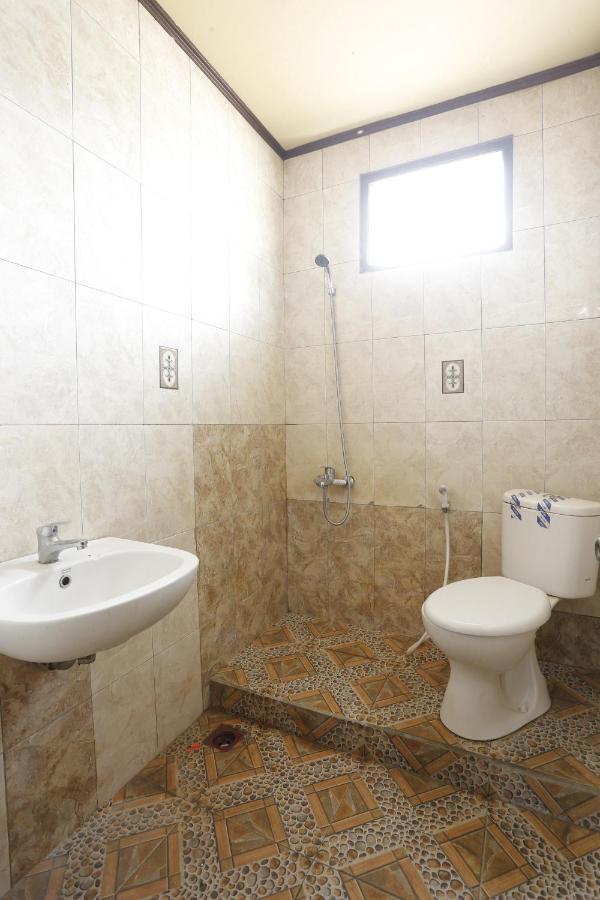 Oyo 93119 Guest House Leo Patra Muara Badak 外观 照片